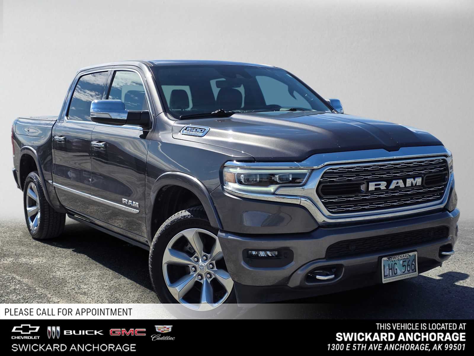 2022 RAM 1500 Limited Crew Cab 4x4 5'7" Box in Gray — front three-quarter view