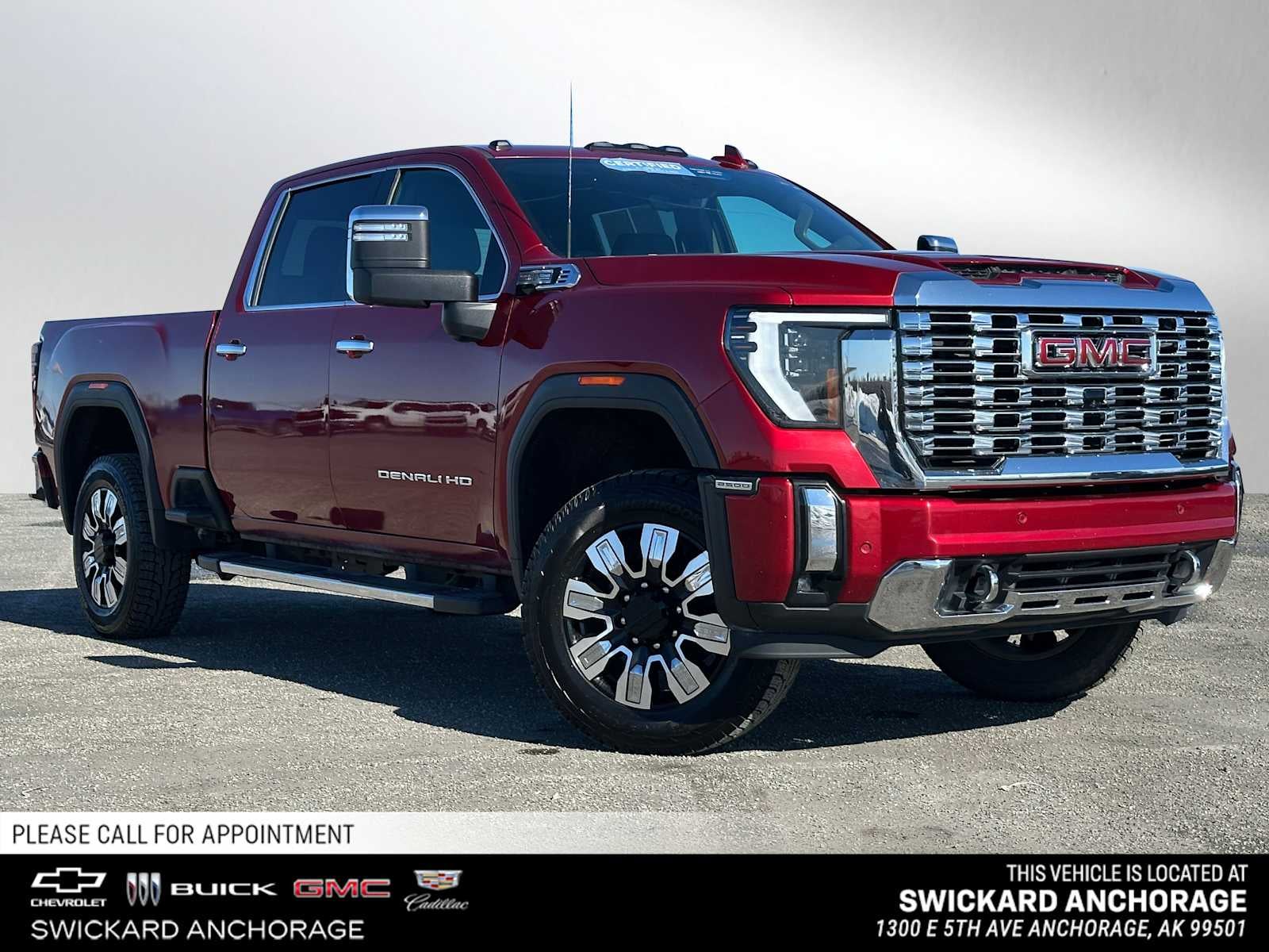 2024 GMC Sierra 2500 HD Denali in Volcanic Red Tintcoat — front three-quarter view