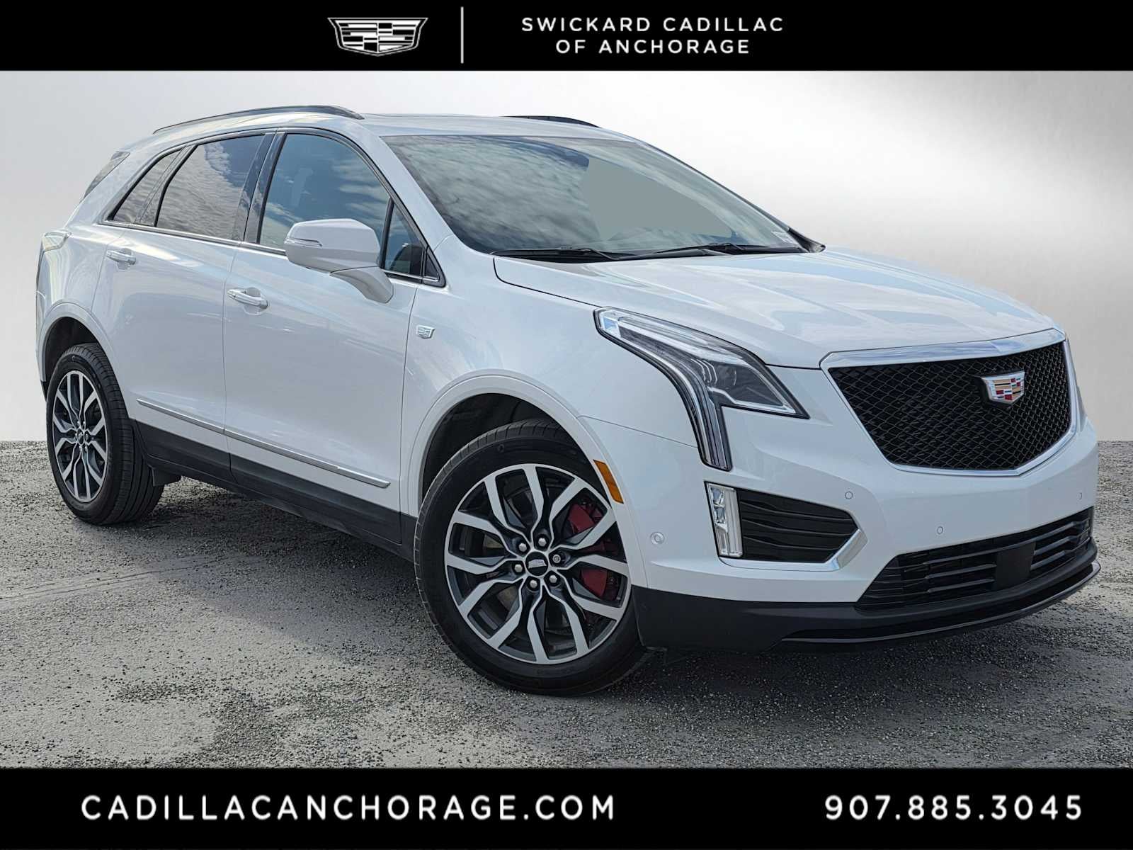 2024 Cadillac XT5 Sport in Crystal White Tricoat — front three-quarter view
